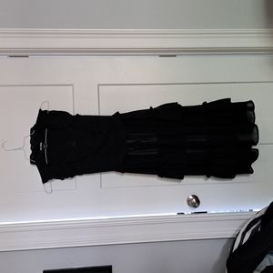 Black high low ruffle vest